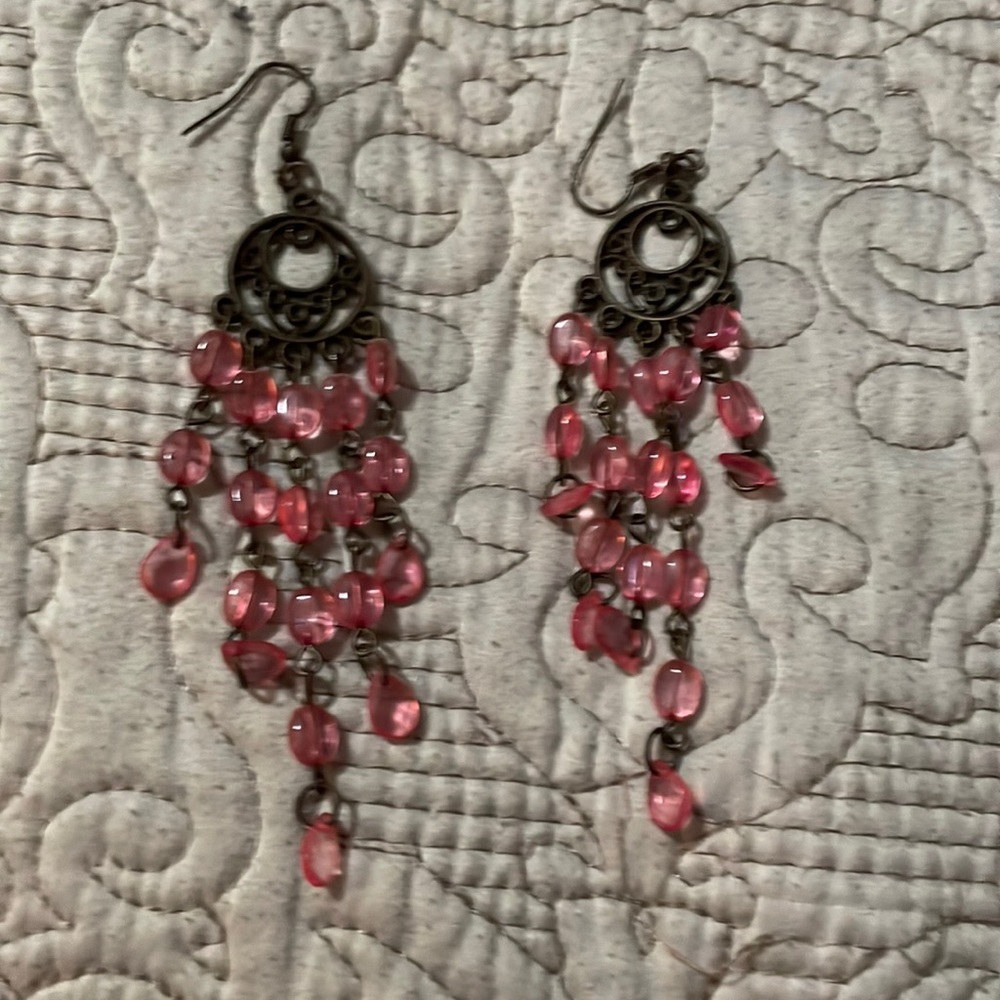 Pink Beaded Boutique chandelier earrings.